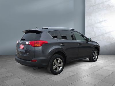 2015 Toyota RAV4 — rear three-quarter view