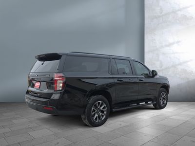 2024 Chevrolet Suburban — rear three-quarter view