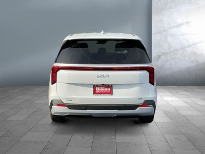 2026 Kia Carnival Hybrid — rear three-quarter view