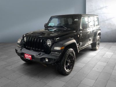 2019 Jeep Wrangler Unlimited — front three-quarter view