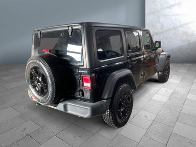 2019 Jeep Wrangler Unlimited — rear three-quarter view