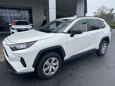 2021 Toyota RAV4 LE — rear three-quarter view