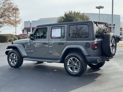 2019 Jeep Wrangler Unlimited Sahara — rear three-quarter view