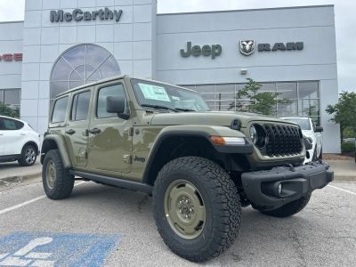 2025 Jeep Wrangler JLXL74 — front three-quarter view