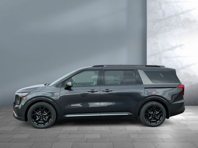 2026 Kia Carnival — rear three-quarter view