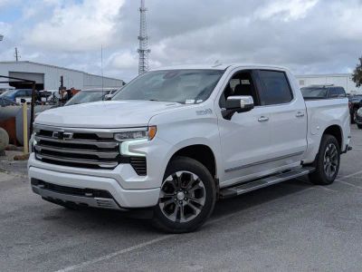 2024 Chevrolet Silverado 1500 High Country in Beige — front three-quarter view