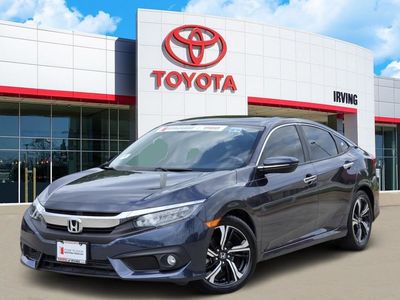 2018 Honda Civic Touring in Blue — front three-quarter view