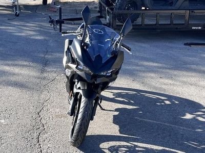 2026 Kawasaki Ninja 500 Metallic Flat Spark Black — rear three-quarter view