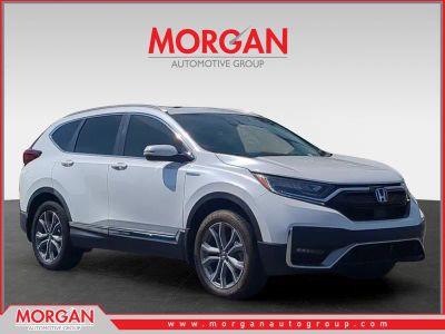 2020 Honda CR-V Hybrid Touring in White — front three-quarter view