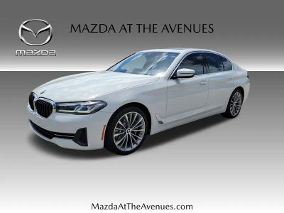 2022 BMW 5 Series 530i in White — front three-quarter view