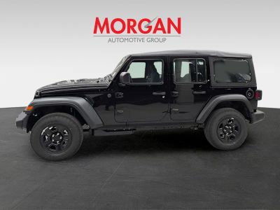 2026 Jeep Wrangler — rear three-quarter view