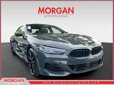 2026 BMW 8 Series 840i in Dravit Grey Metallic — front three-quarter view