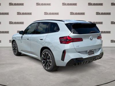 2026 BMW X3 — rear three-quarter view