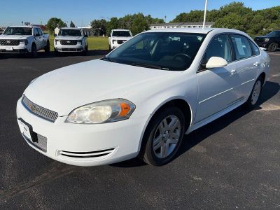 2012 Chevrolet Impala LT FWD in Summit White — front three-quarter view