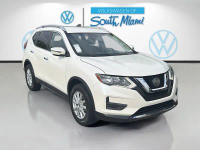 2020 Nissan Rogue SV in Pearl White Tricoat — front three-quarter view
