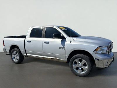 2014 RAM 1500 Big Horn in Bright Silver Metallic Clearcoat — front three-quarter view