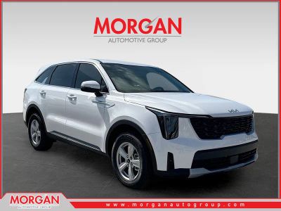 2026 Kia Sorento LX in Glacial White Pearl — front three-quarter view