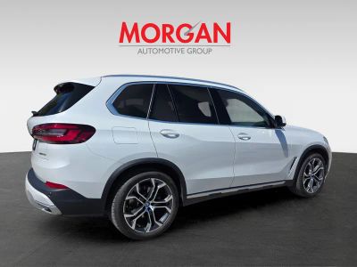 2023 BMW X5 — rear three-quarter view