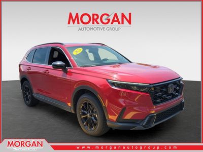 2023 Honda CR-V Hybrid Sport in Radiant Red — front three-quarter view