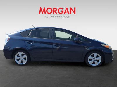 2015 Toyota Prius — rear three-quarter view