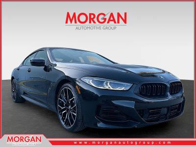 2026 BMW 8 Series 840i in Black Sapphire Metallic — front three-quarter view