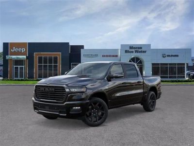 2026 RAM Ram 1500 RAM 1500 LARAMIE CREW CAB 4X4 5'7' BOX in Diamond Black Crystal Pearl-Coat Exterior Paint — front three-quarter view