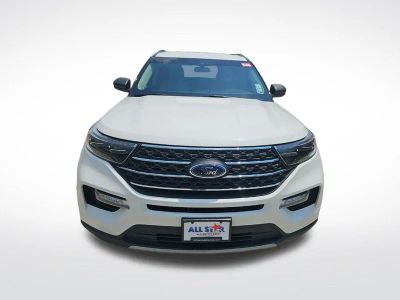 2022 Ford Explorer XLT in Star White Metallic Tri-Coat — front three-quarter view