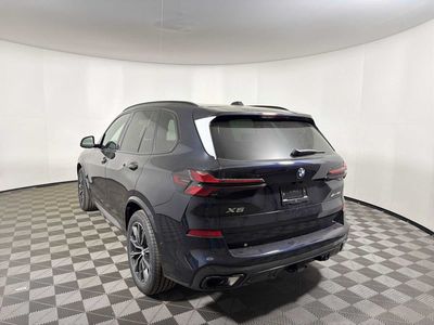 2026 BMW X5 xDrive40i — rear three-quarter view