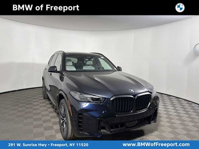2026 BMW X5 xDrive40i xDrive40i in Carbon Black Metallic — front three-quarter view