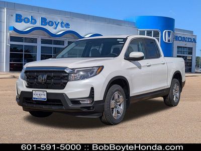 2026 Honda Ridgeline RTL in Platinum White Pearl — front three-quarter view