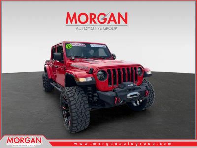 2021 Jeep Gladiator Rubicon in Firecracker Red Clearcoat — front three-quarter view