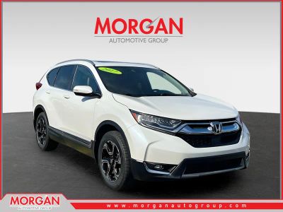 2017 Honda CR-V Touring in White — front three-quarter view