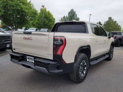 2026 GMC Sierra EV — rear three-quarter view