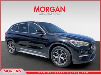 2016 BMW X1 xDrive28i in Black — front three-quarter view