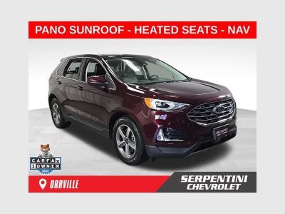 2021 Ford Edge SEL in Red — front three-quarter view