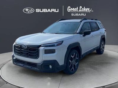 2026 Subaru OUTBACK Touring XT in Crystal White Pearl — front three-quarter view