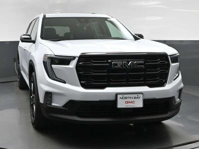 2026 GMC Acadia Elevation in Glacier White Tricoat — front three-quarter view