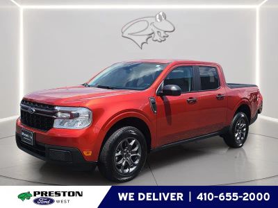 2024 Ford Maverick XLT in Hot Pepper Red Metallic Tinted Clearcoat — front three-quarter view