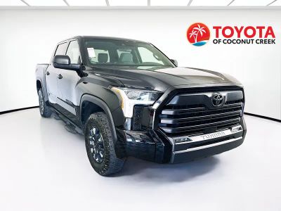 2025 Toyota Tundra 4WD SR5 in Midnight Black Metallic — front three-quarter view