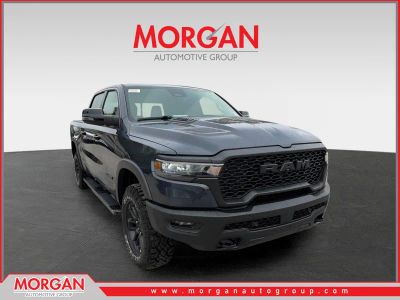 2026 Ram 1500 Rebel in Forged Blue Metallic — front three-quarter view