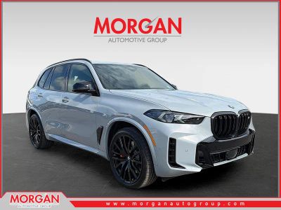 2026 BMW X5 M60i in Brooklyn Grey Metallic — front three-quarter view