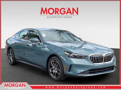 2026 BMW i5 eDrive40 in Cape York Green Metallic — front three-quarter view
