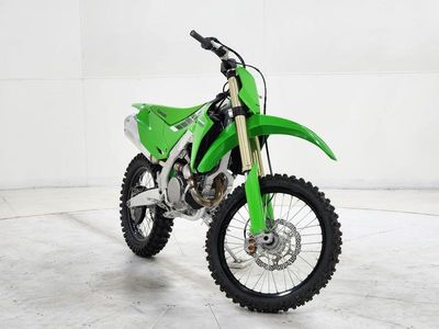 2025 Kawasaki KX450X in GRN — front three-quarter view