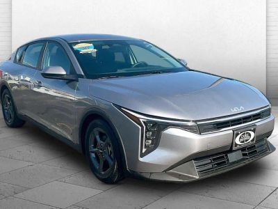 2025 Kia K4 LXS in Steel Gray — front three-quarter view