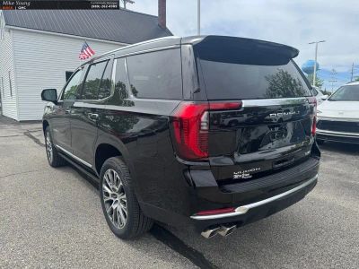 2026 GMC Yukon — rear three-quarter view