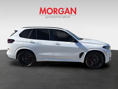 2026 BMW X5 — rear three-quarter view