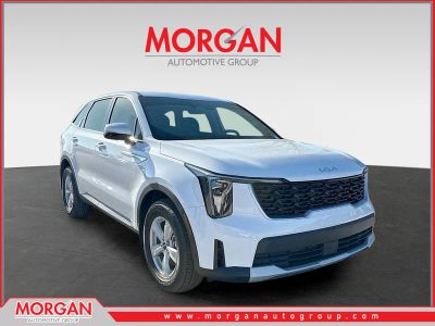 2026 Kia Sorento LX in Glacial White Pearl — front three-quarter view