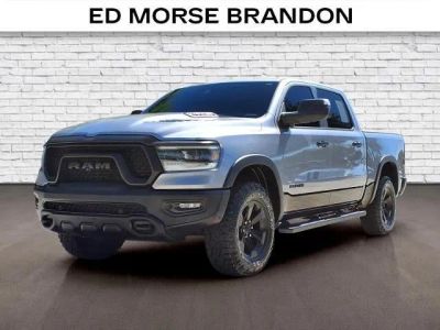 2023 RAM 1500 Rebel in Giy/Silver — front three-quarter view