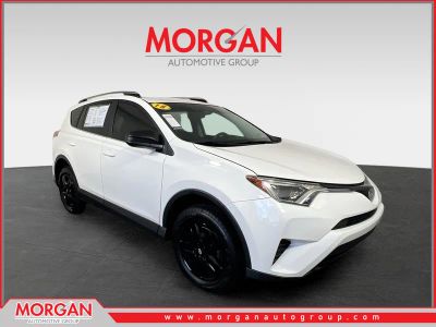 2018 Toyota RAV4 LE in Super White — front three-quarter view