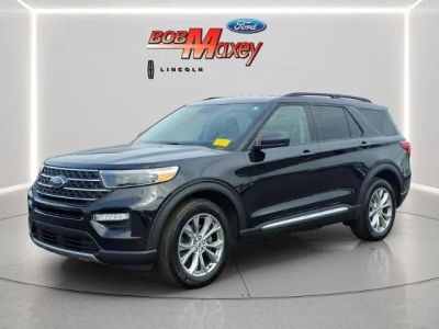 2023 Ford Explorer XLT in Agate Black Metallic — front three-quarter view